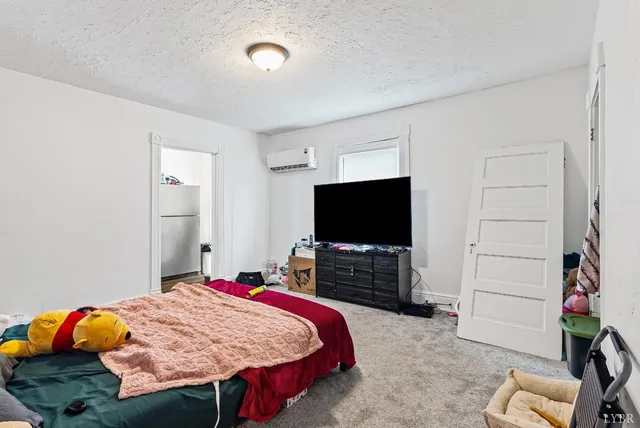 a view of a backyard with sitting area