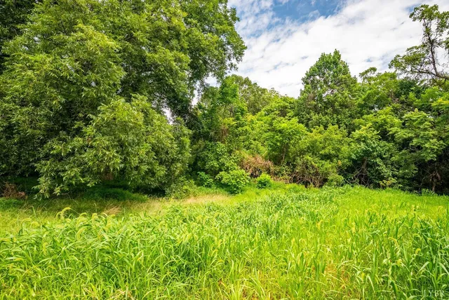 a view of a balcony with wooden floor