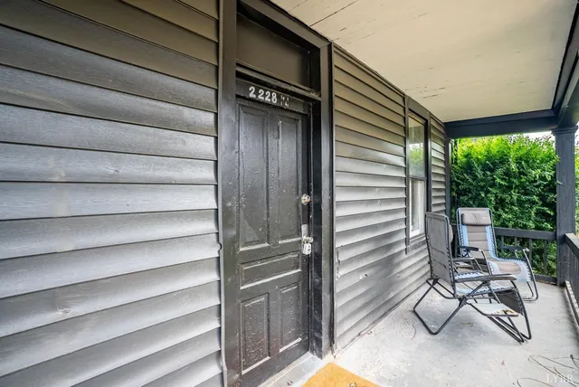 a aerial view of a house with pool