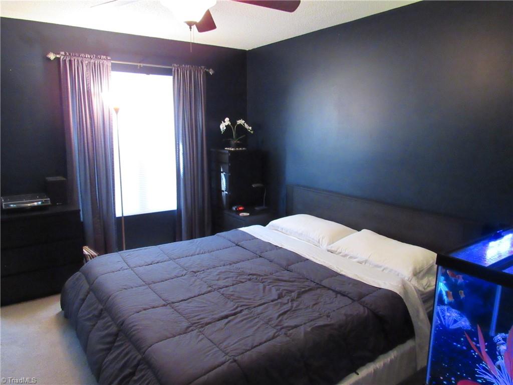 1819 Ebert Road Winston-Salem, NC 27103 - Photo 20 of 29 Master bedroom is painted a navy blue