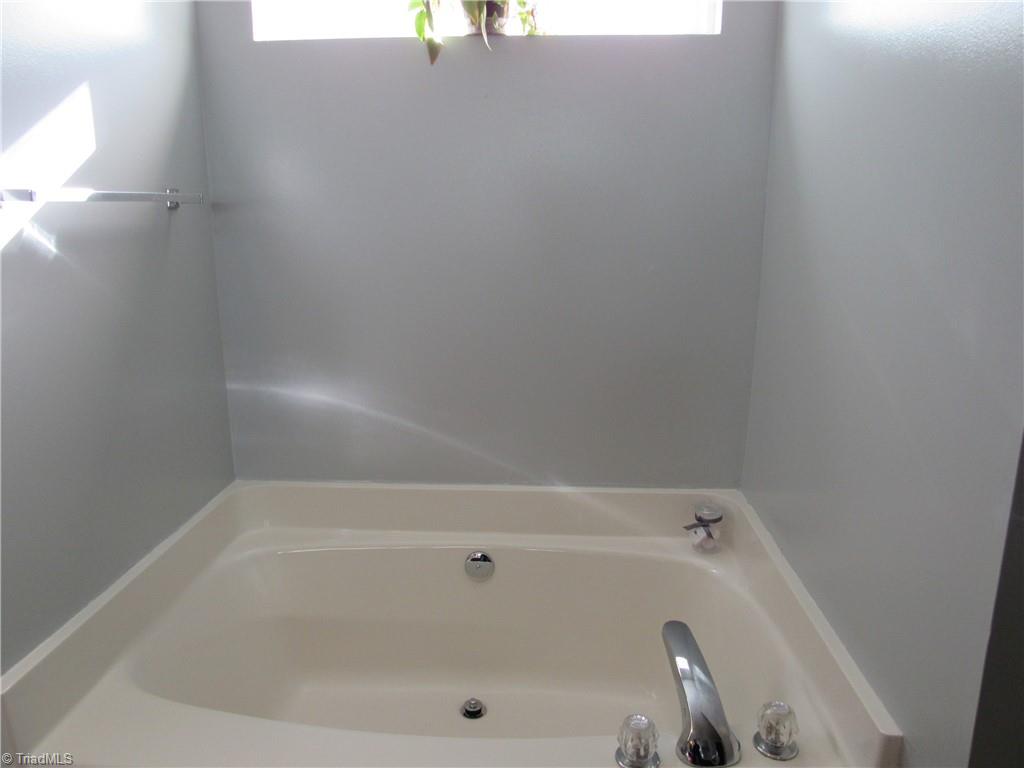 1819 Ebert Road Winston-Salem, NC 27103 - Photo 24 of 29 Garden tub with a transom window for extra light