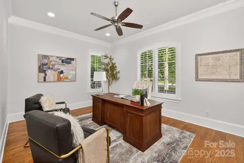 a view of entryway with wooden floor and stairs