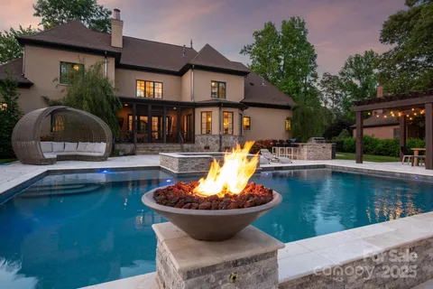 a view of a swimming pool with a patio