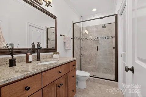 a bedroom with bed and a window