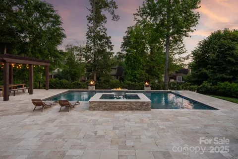 a front view of house with yard outdoor seating and barbeque oven