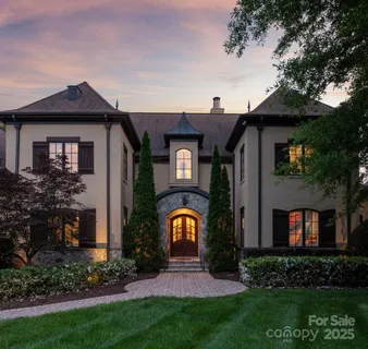 a living room with fireplace furniture and a flat screen tv