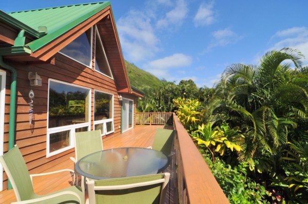 7158 Kahuna Road, Unit 1 & 2 Kapaa, HI 96746 - Photo 1 of 23 a view of house with swimming pool outdoor seating