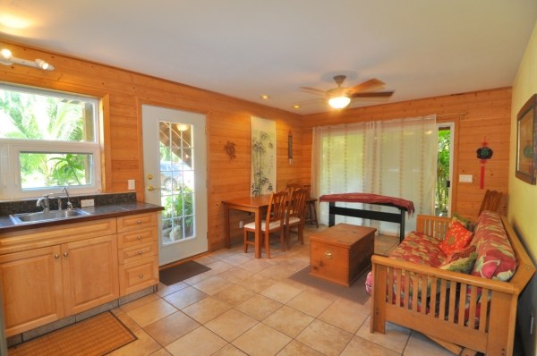 7158 Kahuna Road, Unit 1 & 2 Kapaa, HI 96746 - Photo 19 of 23 a very nice looking dining room with furniture and a large window