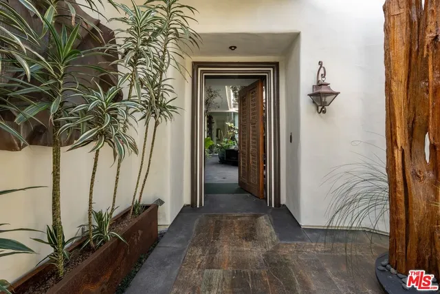a living room with furniture fireplace and a flat screen tv