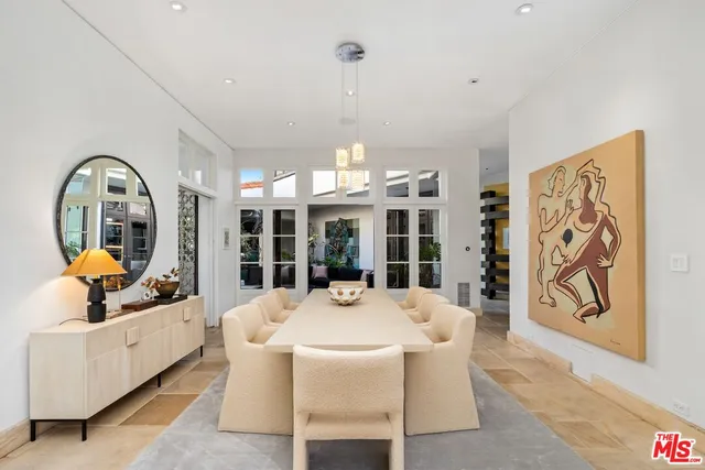 a view of a a dining room with furniture window and outside view