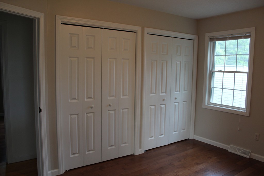375 Springdale Road Westfield, MA 01085 - Photo 25 of 26 an empty room with wooden floor and closet area