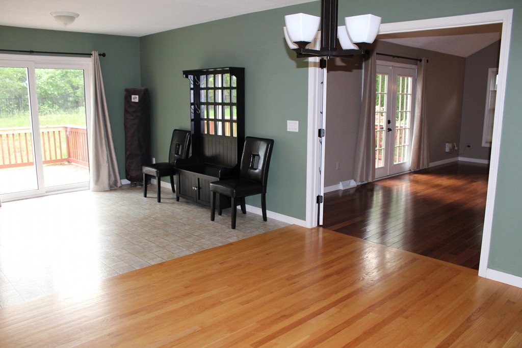 375 Springdale Road Westfield, MA 01085 - Photo 5 of 26 a view of a livingroom with furniture hardwood floor and a window
