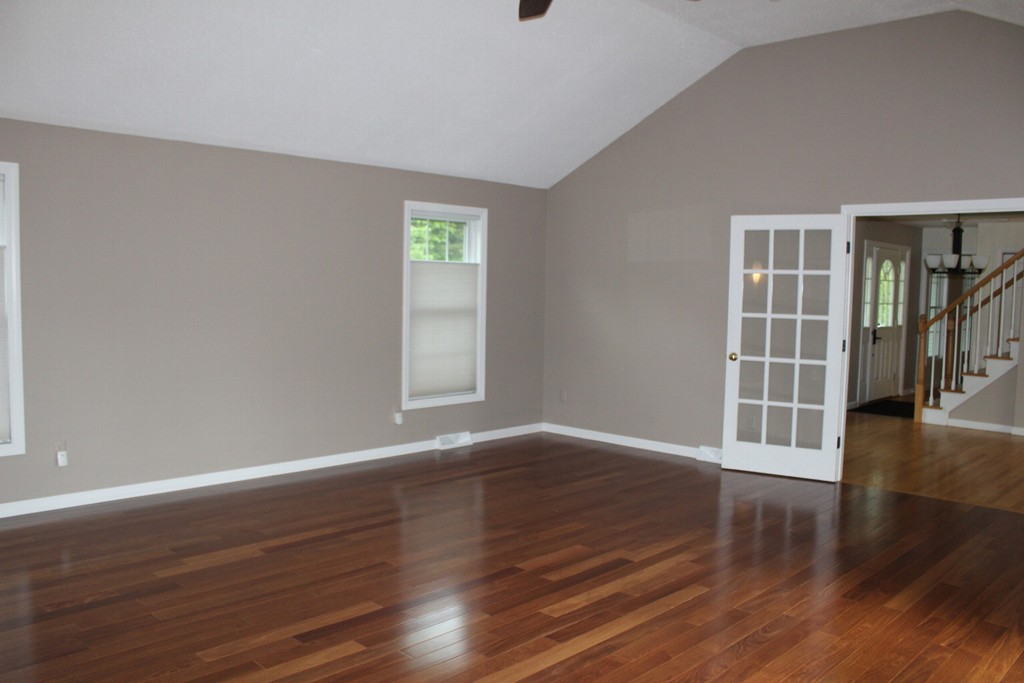 375 Springdale Road Westfield, MA 01085 - Photo 9 of 26 a view of an empty room with wooden floor and a window