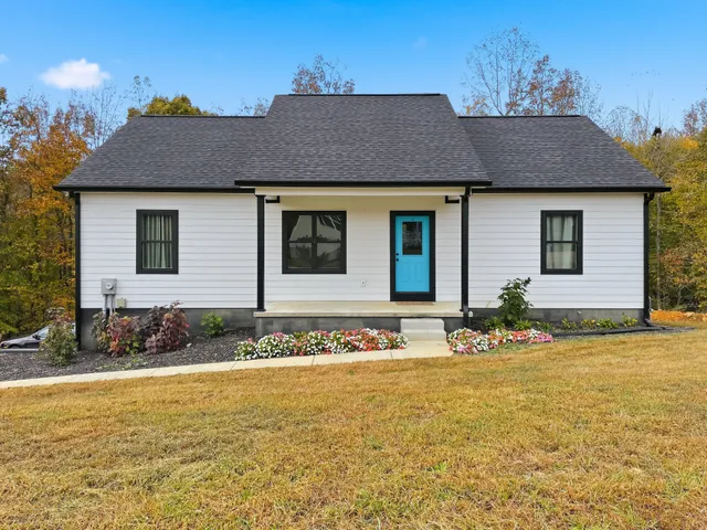 a front view of house with yard