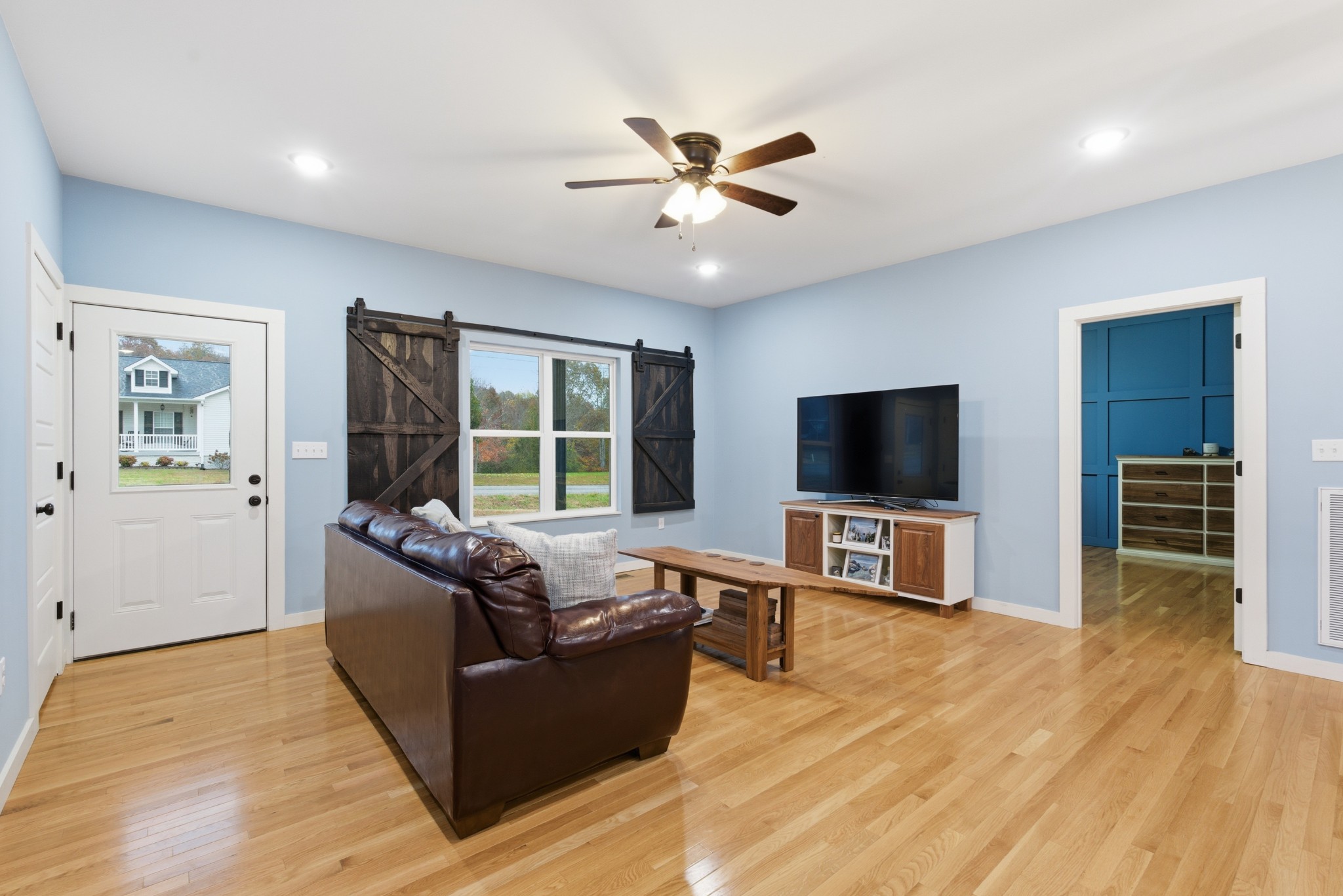 4310 Surji Circle Centerville, TN 37033 - Photo 13 of 27 a living room with furniture and a flat screen tv