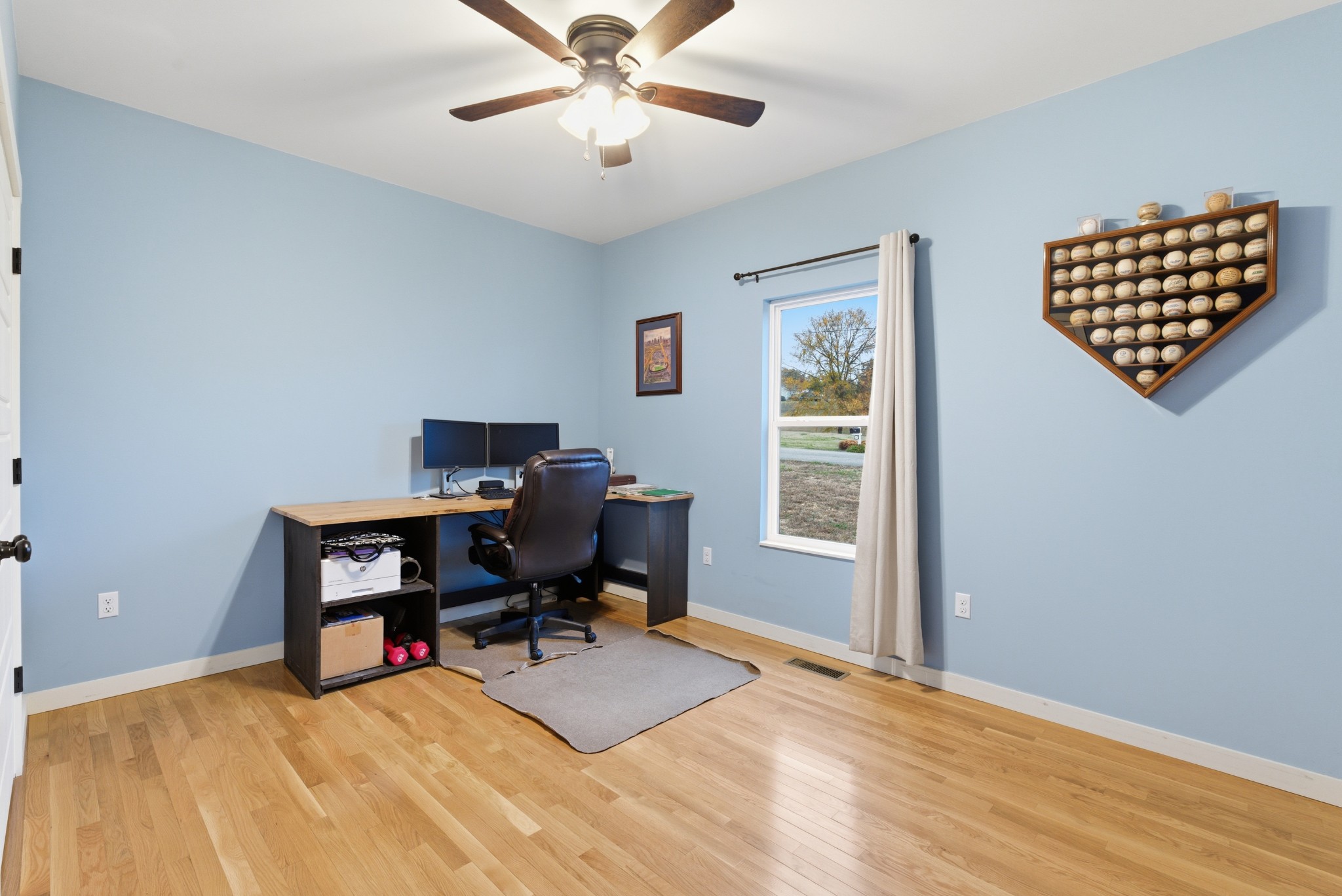 4310 Surji Circle Centerville, TN 37033 - Photo 19 of 27 a view of a workspace with furniture and a window