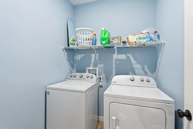 a view of a dining room kitchen counter space and wooden floor