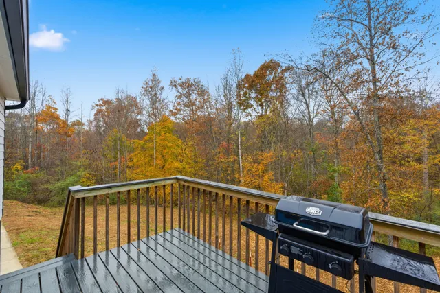 a view of balcony with furniture