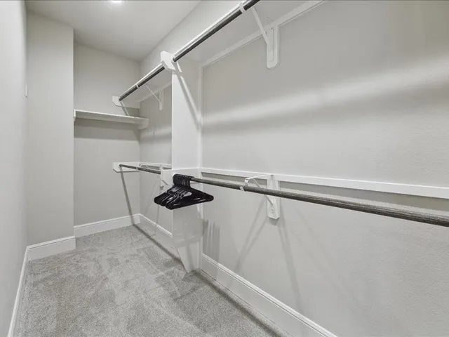 a view of a room with rack on the wall