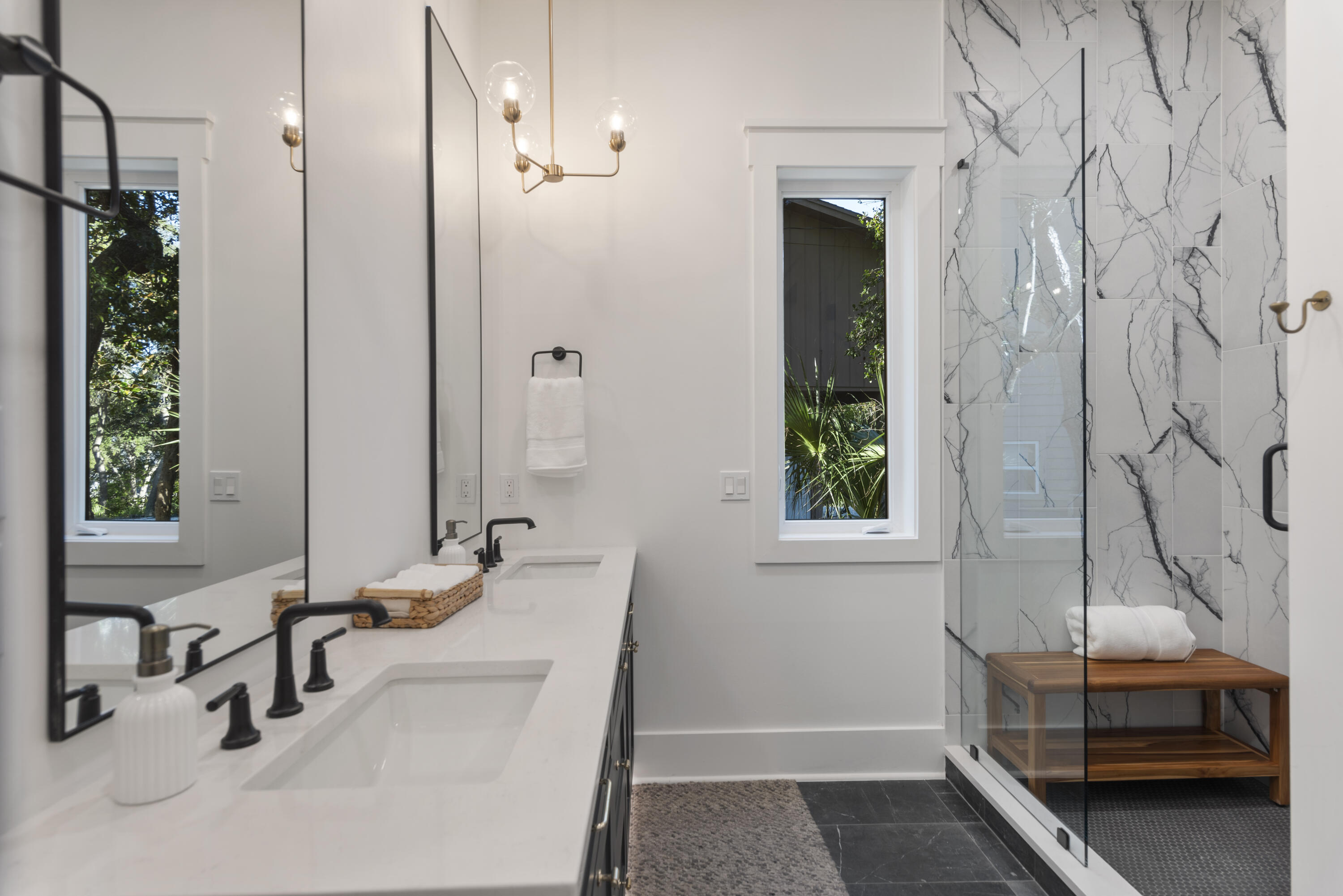 185 Dune Drive Santa Rosa Beach, FL 32459 - Photo 28 of 53 a bathroom with a sink and a mirror