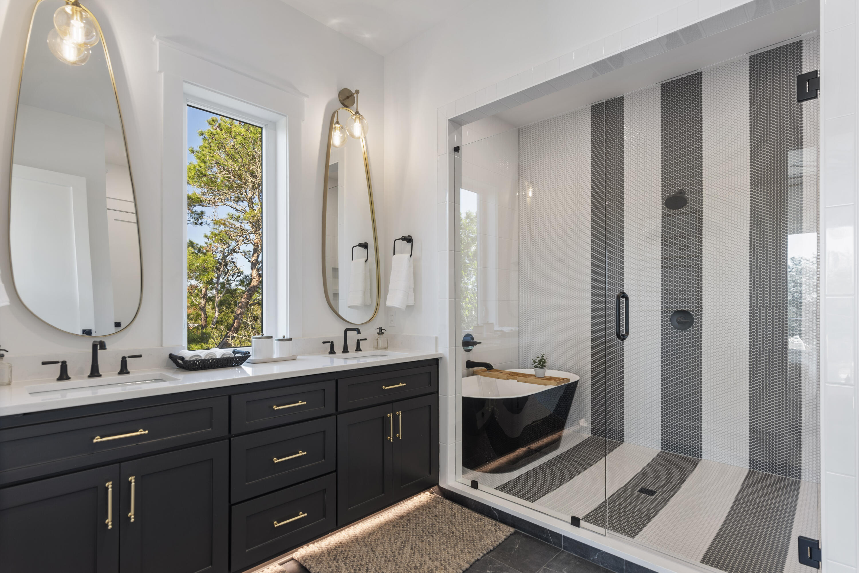 185 Dune Drive Santa Rosa Beach, FL 32459 - Photo 33 of 53 a bathroom with a double vanity sink and a mirror