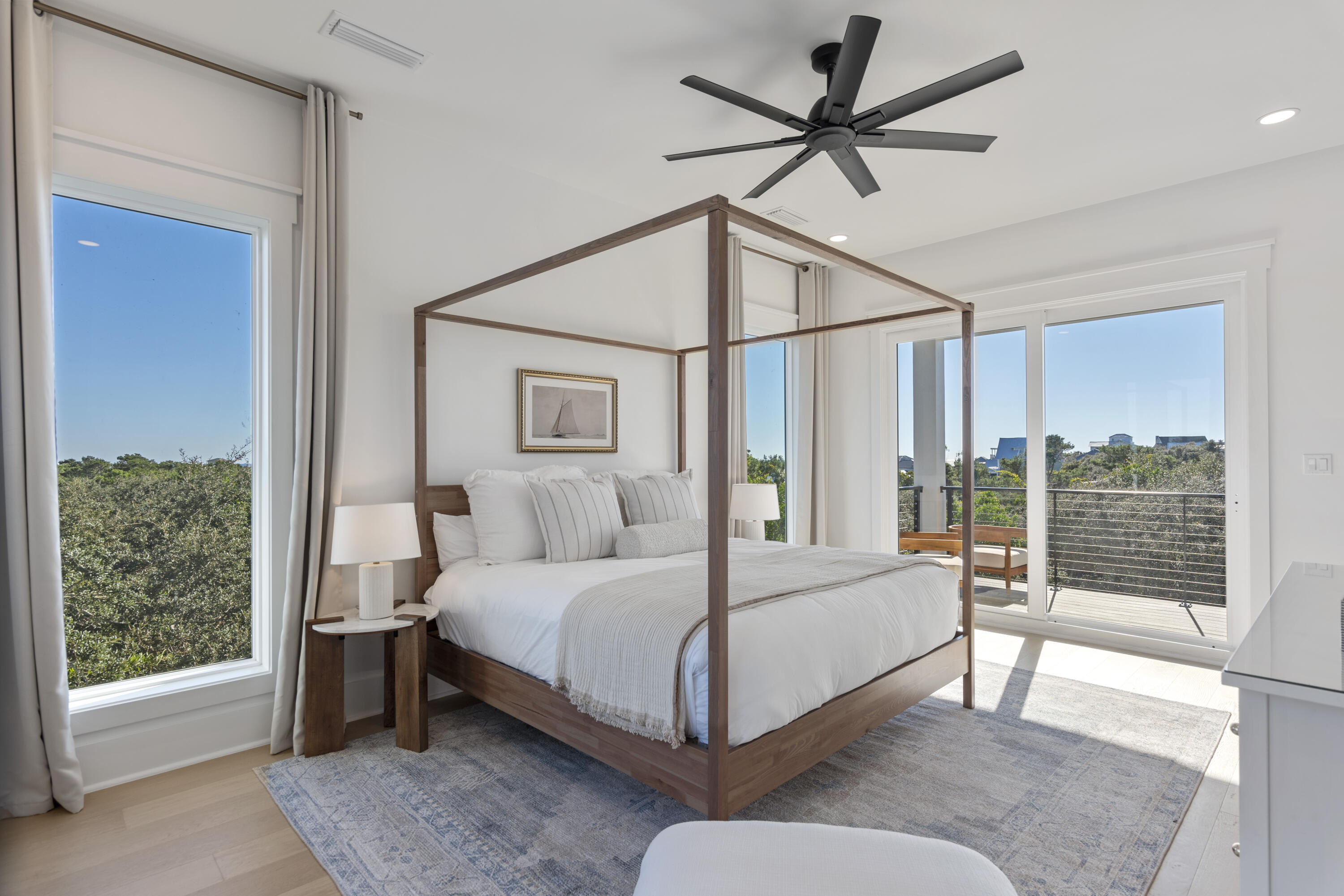 185 Dune Drive Santa Rosa Beach, FL 32459 - Photo 35 of 53 a bedroom with a bed chandelier and a window