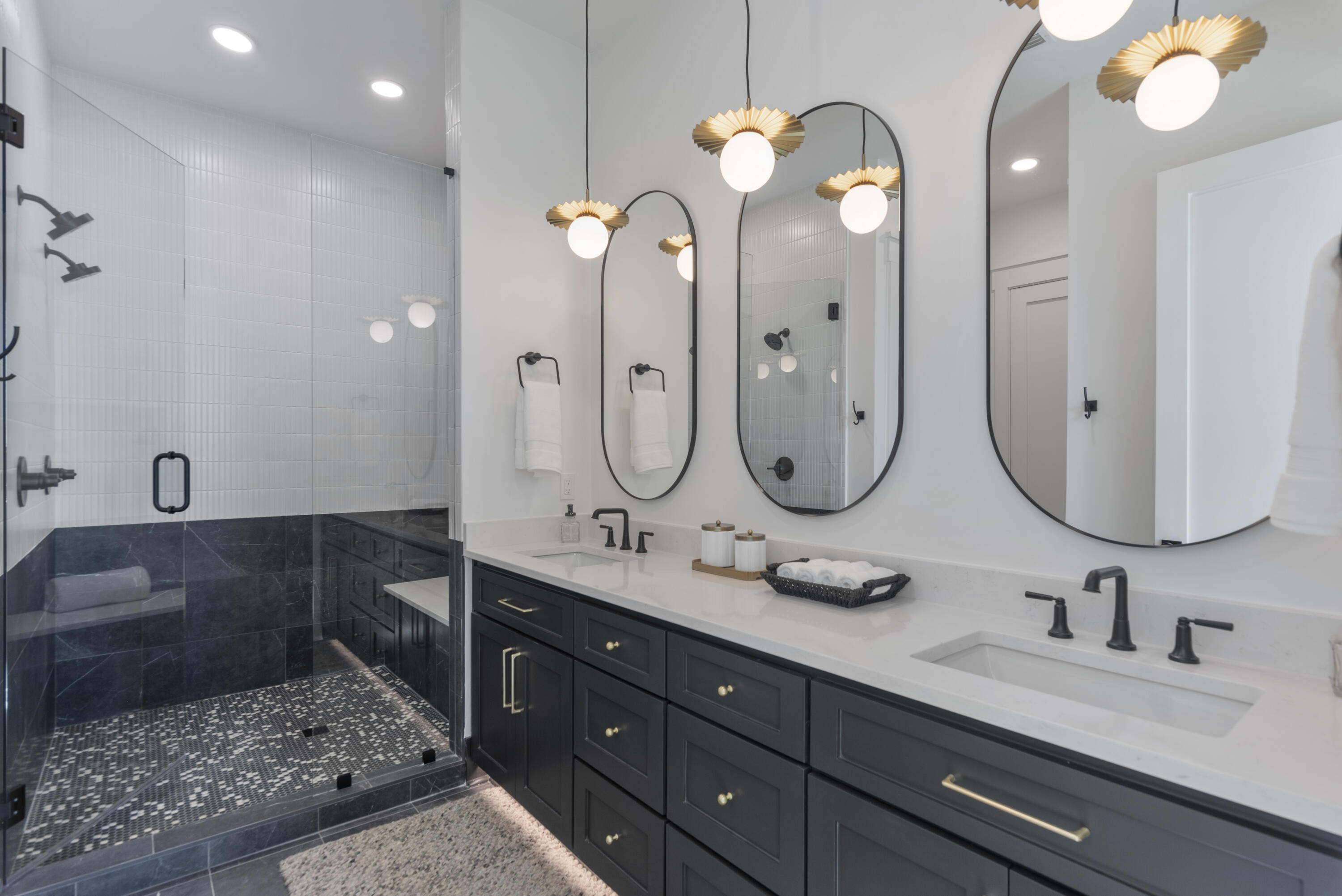 185 Dune Drive Santa Rosa Beach, FL 32459 - Photo 36 of 53 a bathroom with a double vanity sink and a mirror