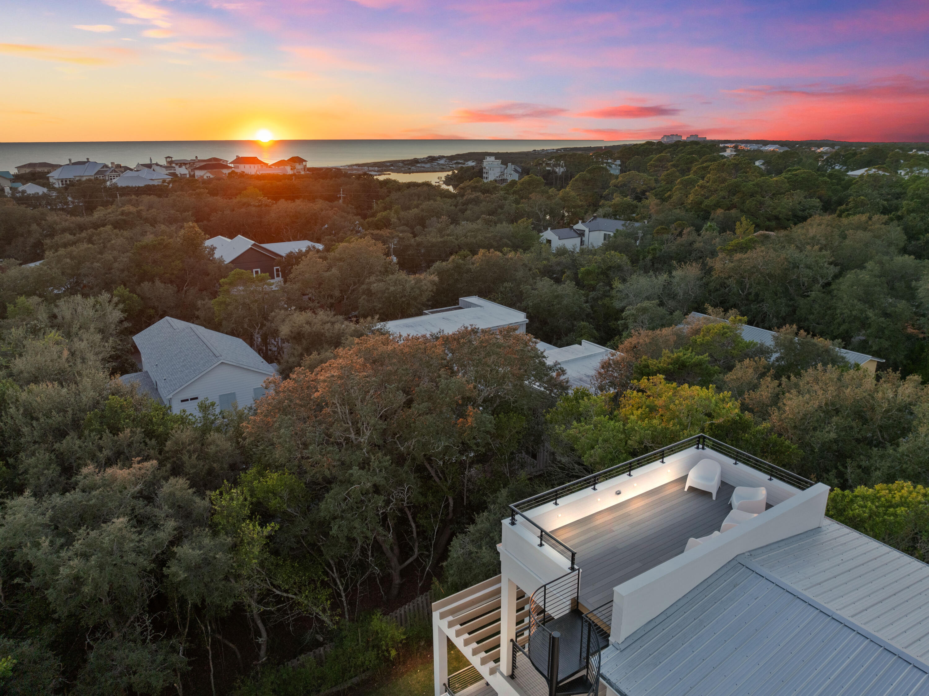 185 Dune Drive Santa Rosa Beach, FL 32459 - Photo 44 of 53 a view of a city with sunset view