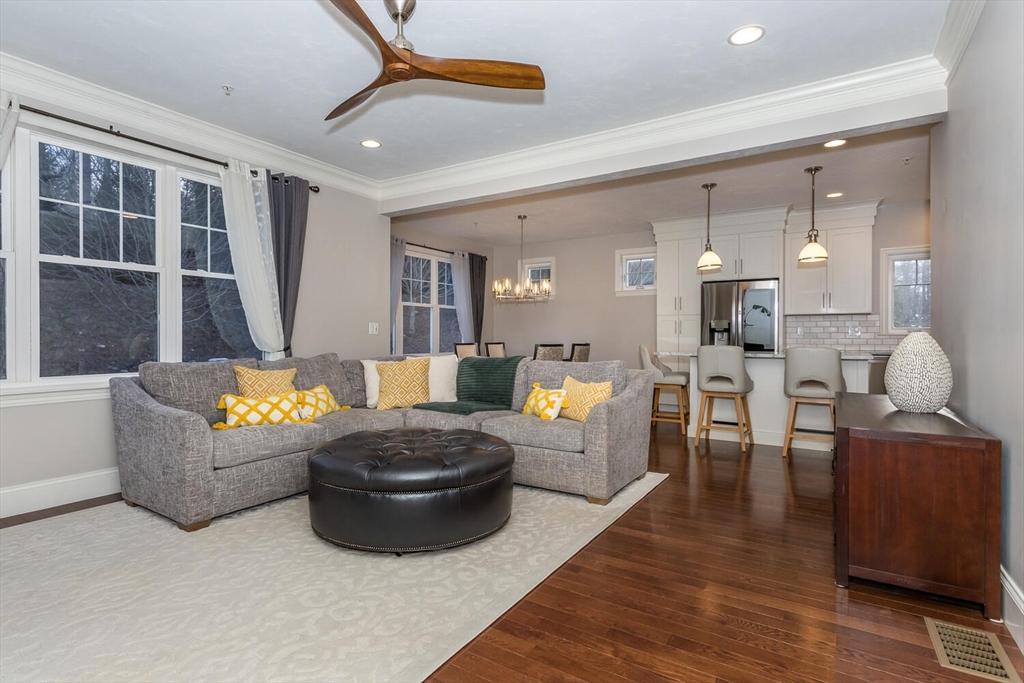25 Brookview Road, Unit 25 Franklin, MA 02038 - Photo 6 of 28 a living room with furniture and a rug