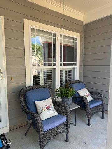 a outdoor living space with furniture and a potted plant
