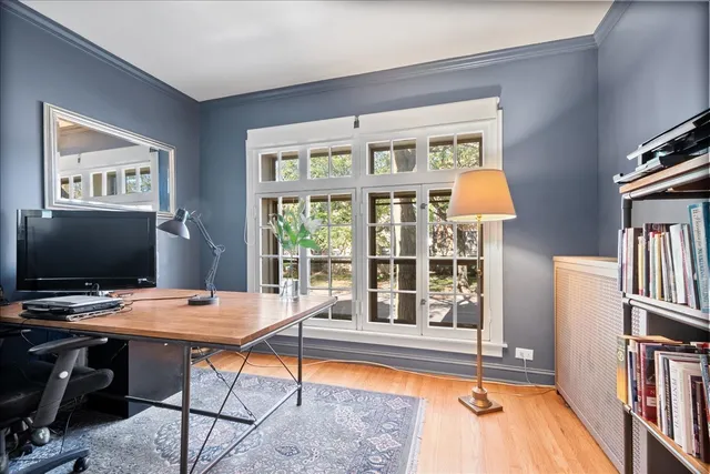 a workspace with furniture and a window