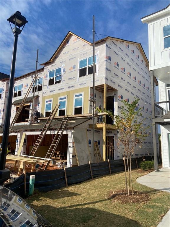 2210 Nena Way, Unit 12 Tucker, GA 30084 - Photo 1 of 1 a view of a building with street