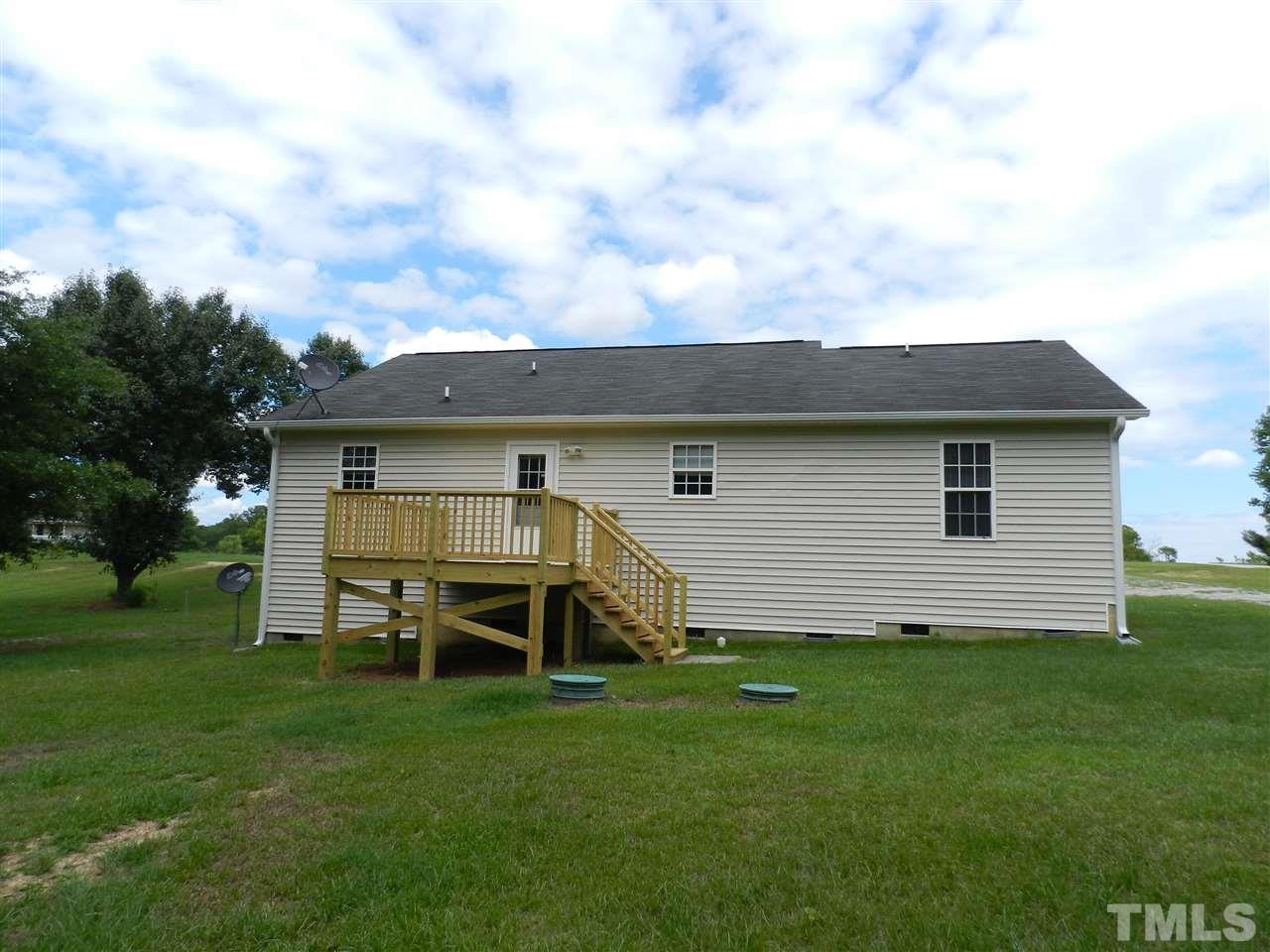 99 Trail Ridge Drive Benson, NC 27504 - Photo 8 of 10 a view of a house with backyard