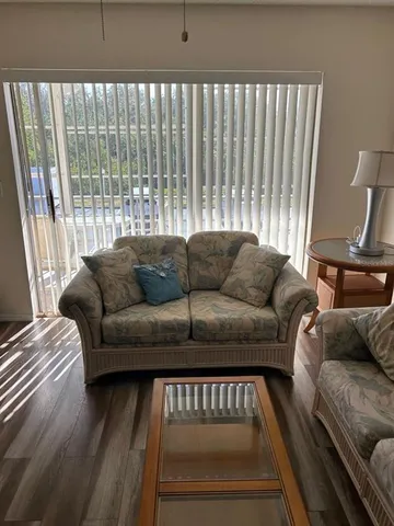 a living room with furniture and a couch