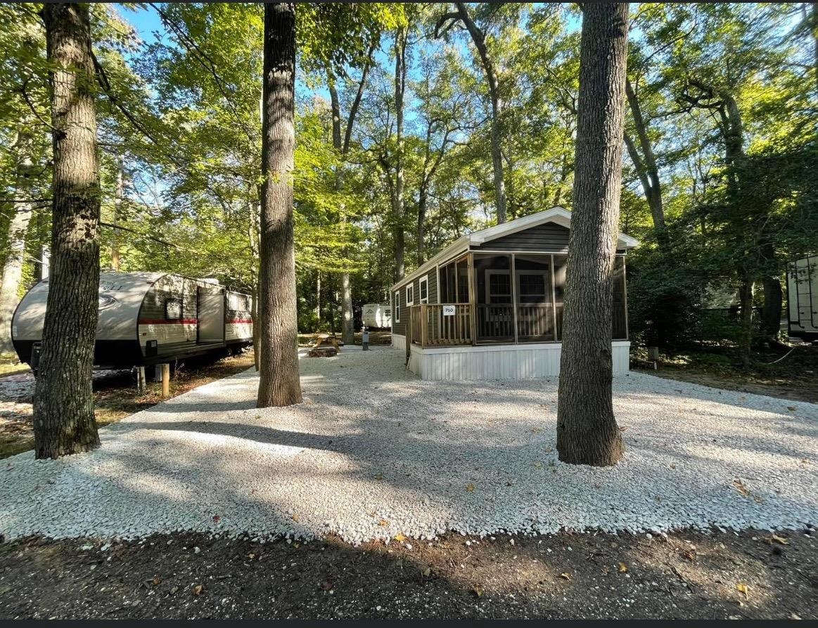 669 Highway 9 Cape May, NJ 08204 - Photo 1 of 10 a view of a house with trees in the background