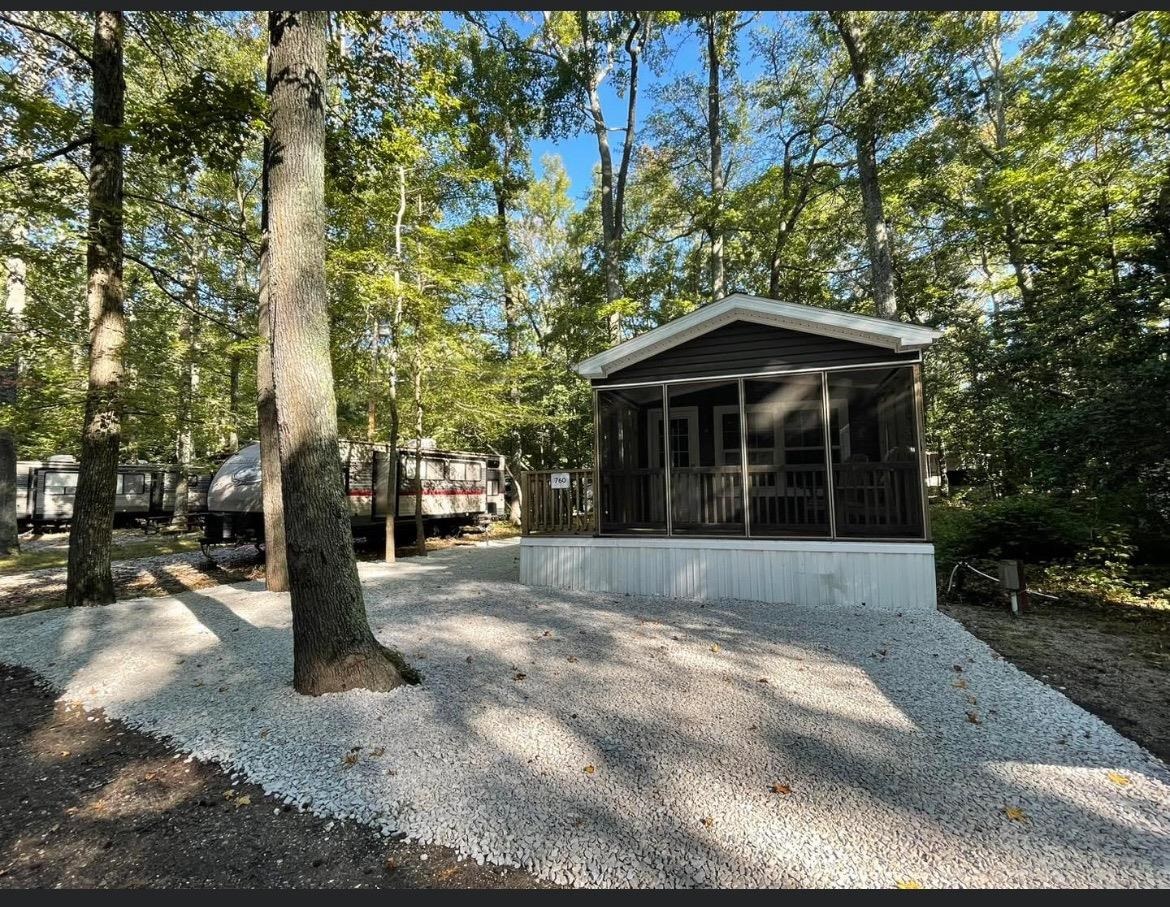 669 Highway 9 Cape May, NJ 08204 - Photo 2 of 10 a front view of a house with a garden