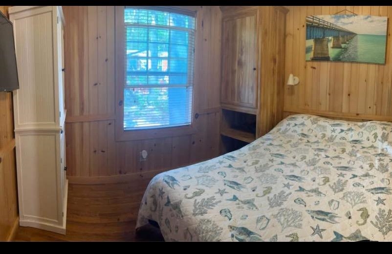 669 Highway 9 Cape May, NJ 08204 - Photo 9 of 10 a bedroom with a bed and a window