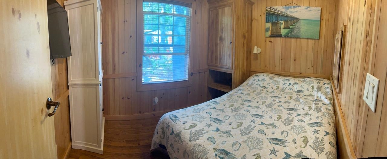 669 Highway 9 Cape May, NJ 08204 - Photo 10 of 10 a bedroom with a bed and a window