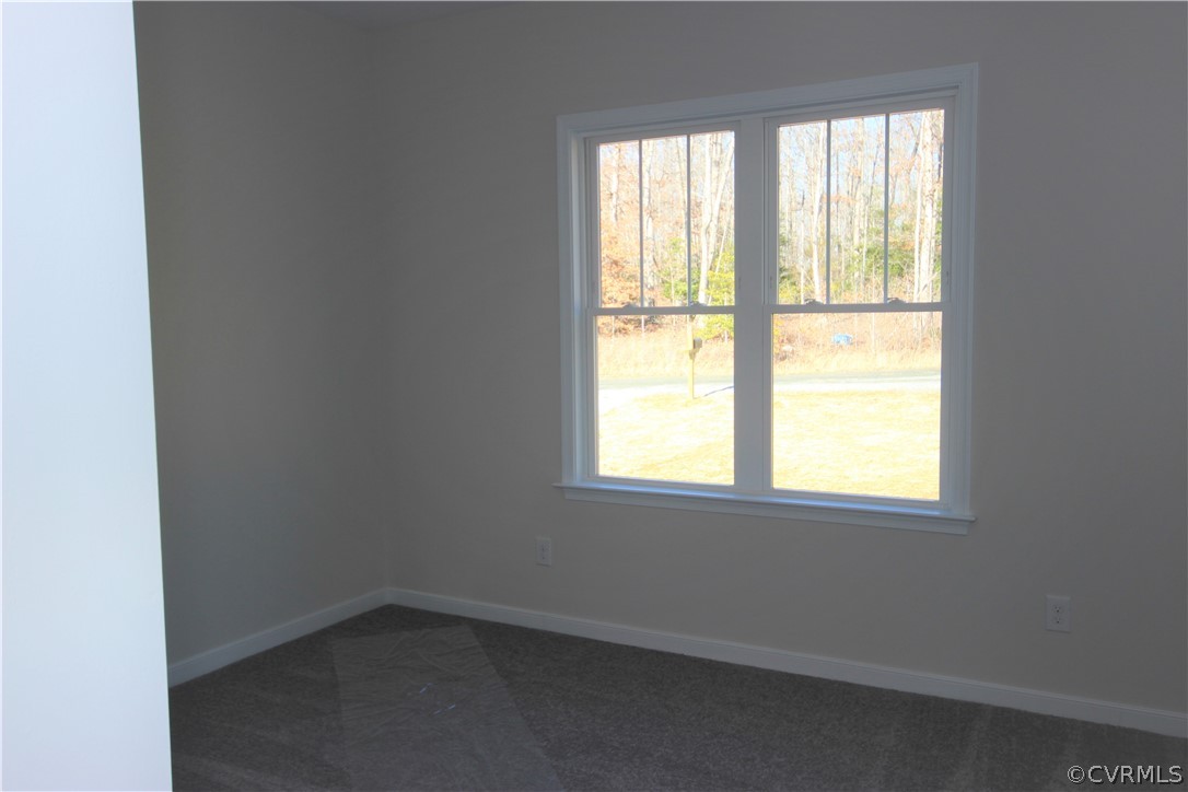165 New S Ridge Road Bumpass, VA 23024 - Photo 15 of 26 an empty room with a window