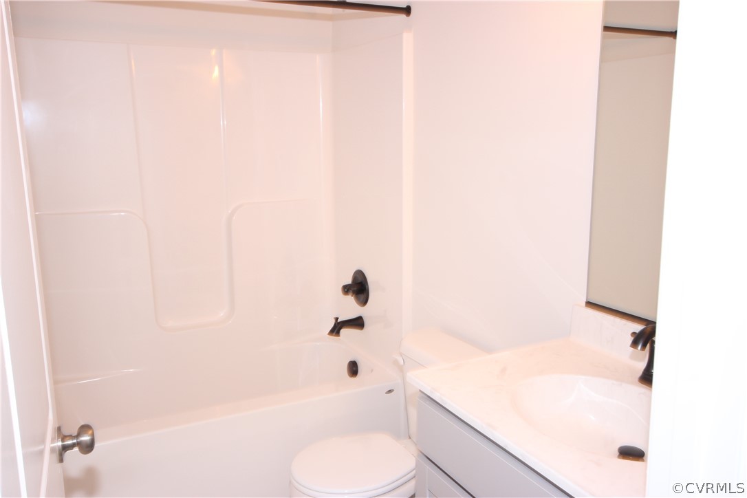 165 New S Ridge Road Bumpass, VA 23024 - Photo 16 of 26 a bathroom with a bathtub and sink
