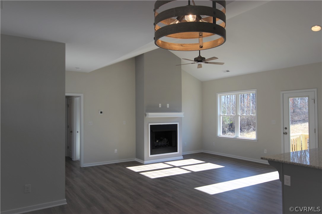 165 New S Ridge Road Bumpass, VA 23024 - Photo 6 of 26 a view of an empty room with window and wooden floor