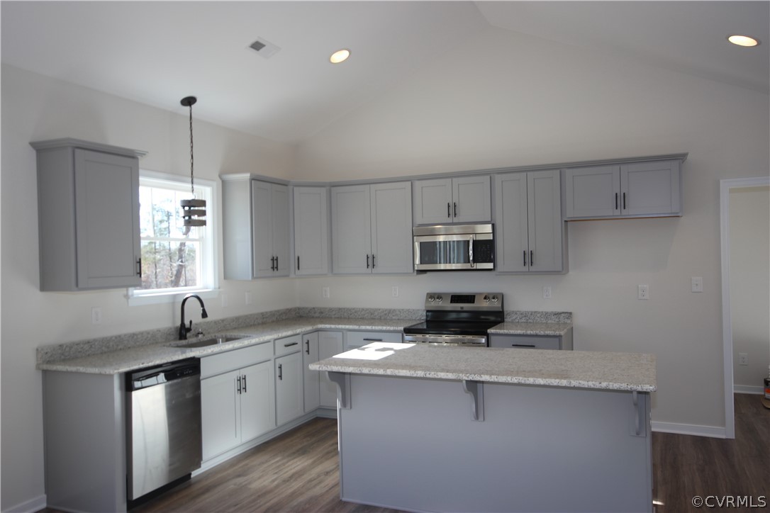 165 New S Ridge Road Bumpass, VA 23024 - Photo 8 of 26 a kitchen with stainless steel appliances a sink stove and cabinets