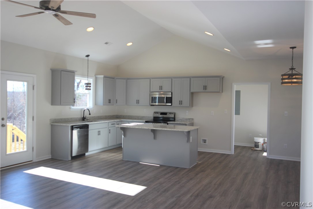 165 New S Ridge Road Bumpass, VA 23024 - Photo 9 of 26 a kitchen with stainless steel appliances a sink a stove a refrigerator and white cabinets