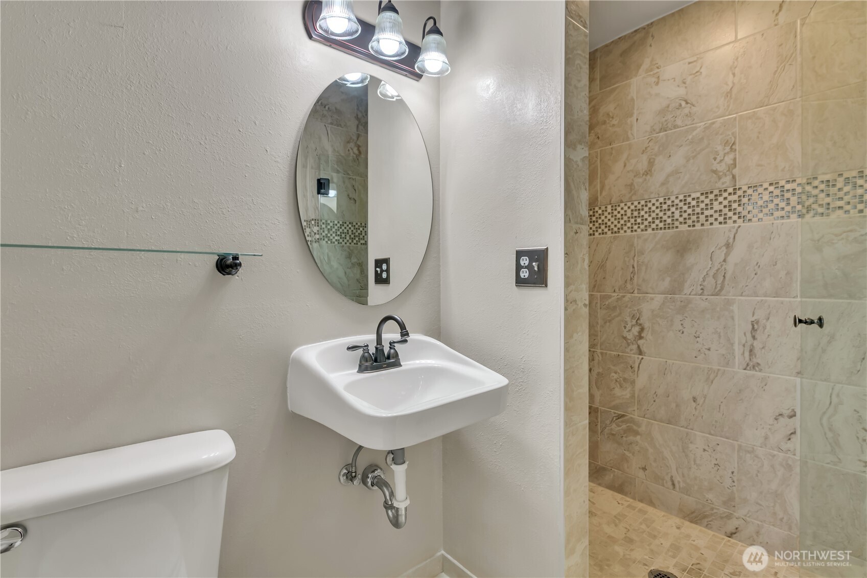 29820 6th Avenue South Federal Way, WA 98003 - Photo 18 of 40 a bathroom with a sink a mirror and shower