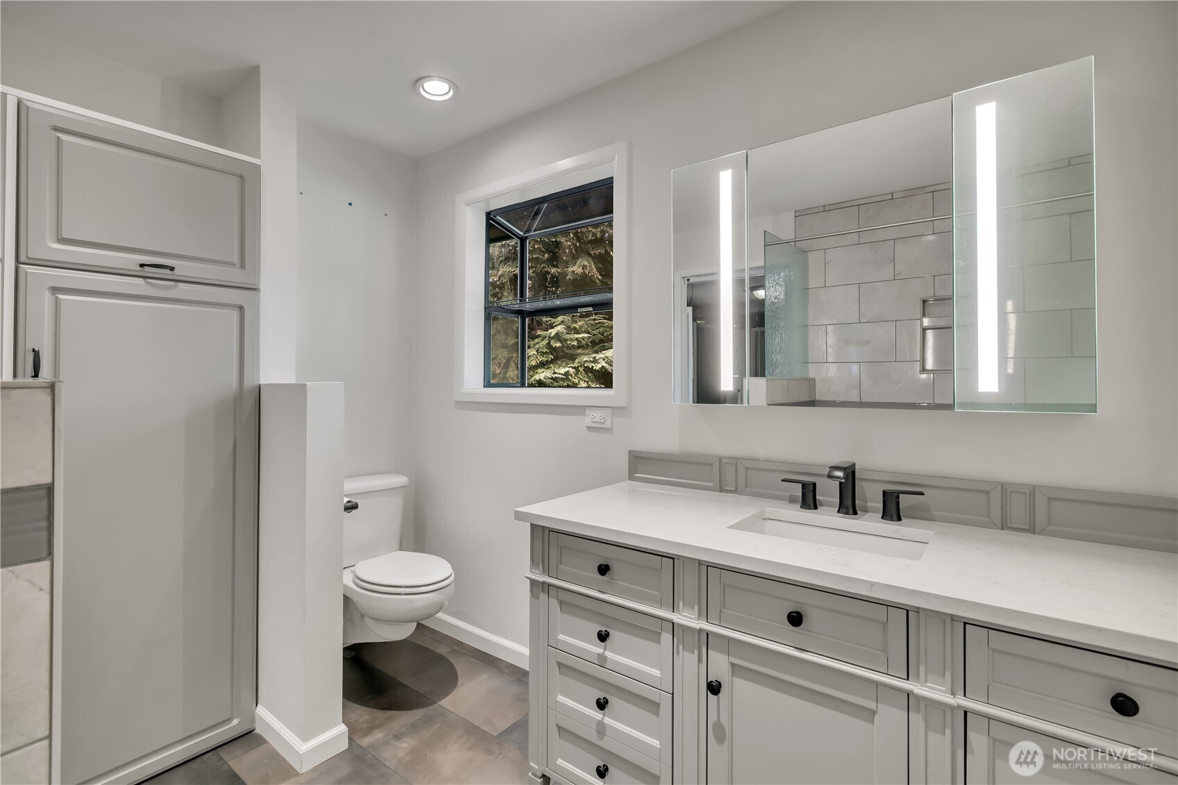 29820 6th Avenue South Federal Way, WA 98003 - Photo 20 of 40 a bathroom with a toilet sink double vanity and mirror