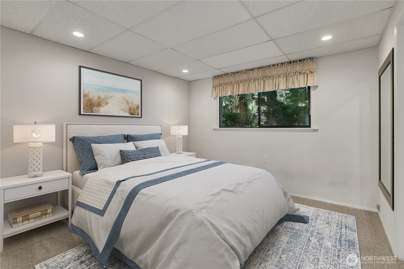 29820 6th Avenue South Federal Way, WA 98003 - Photo 25 of 40 a bedroom with a bed and a painting on the wall
