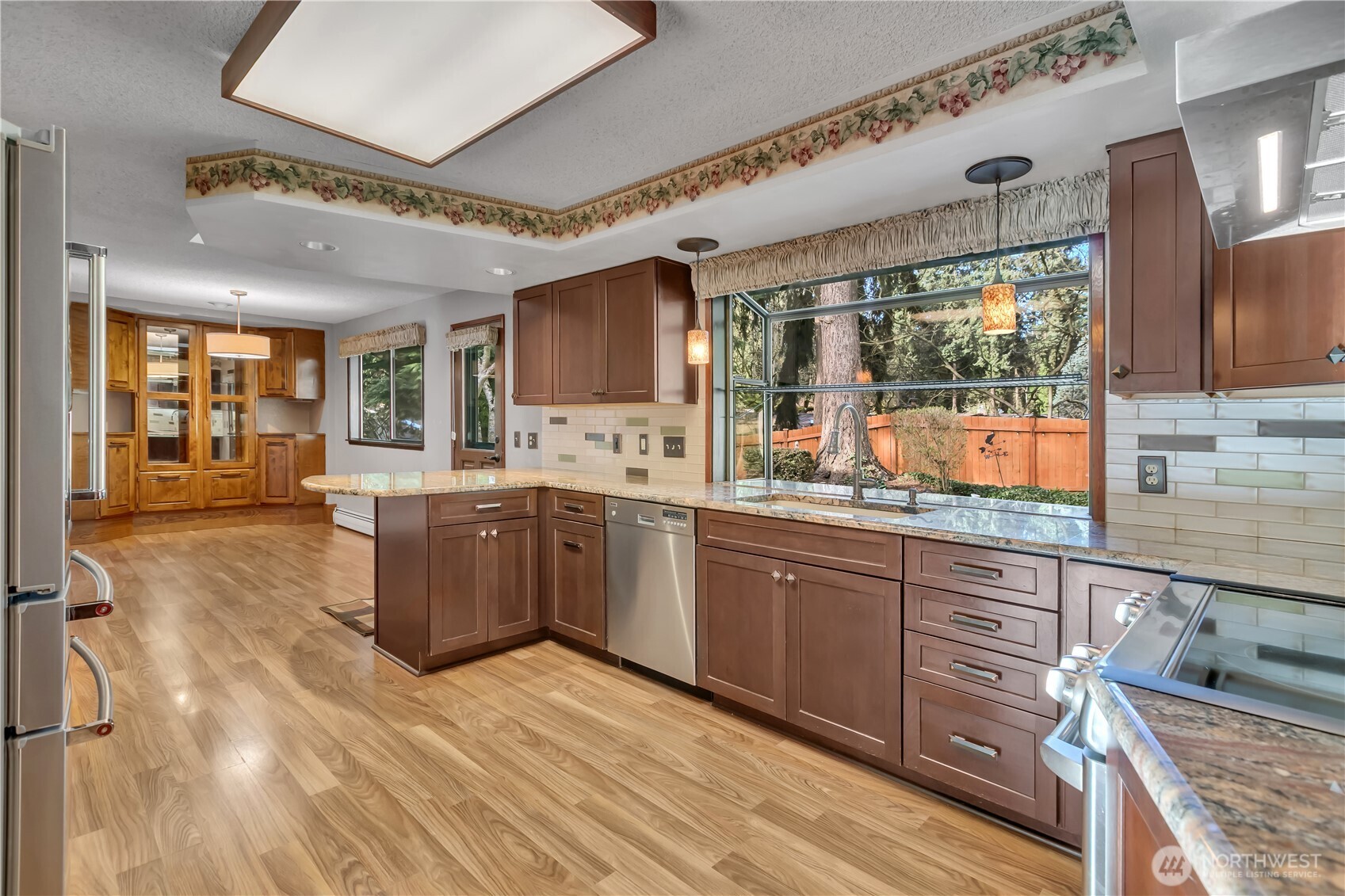 29820 6th Avenue South Federal Way, WA 98003 - Photo 7 of 40 a kitchen with a sink wooden cabinets and counter space