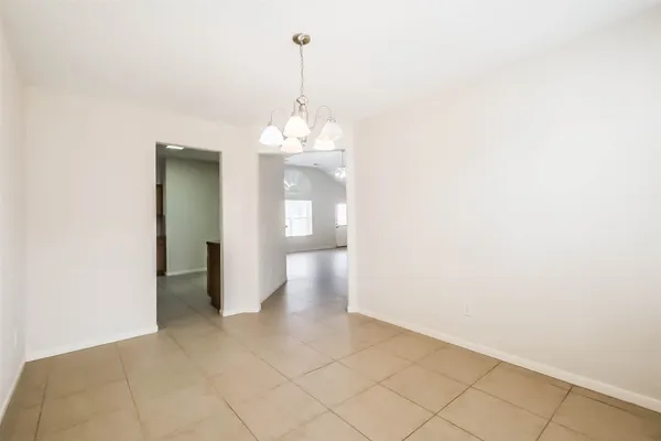 a view of a hallway with a white walls