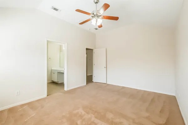 a view of a big room with carpet