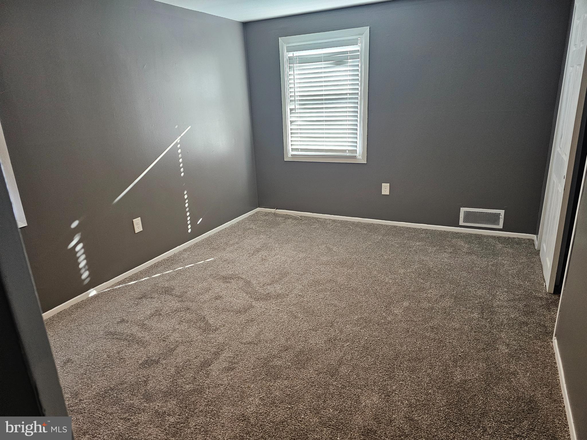 12 Hasting Lane Willingboro, NJ 08046 - Photo 10 of 12 a view of an empty room with a window